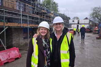 Jayne Bryant MS and Cllr Andrea Lewis at the council's latest housing development in Manselton