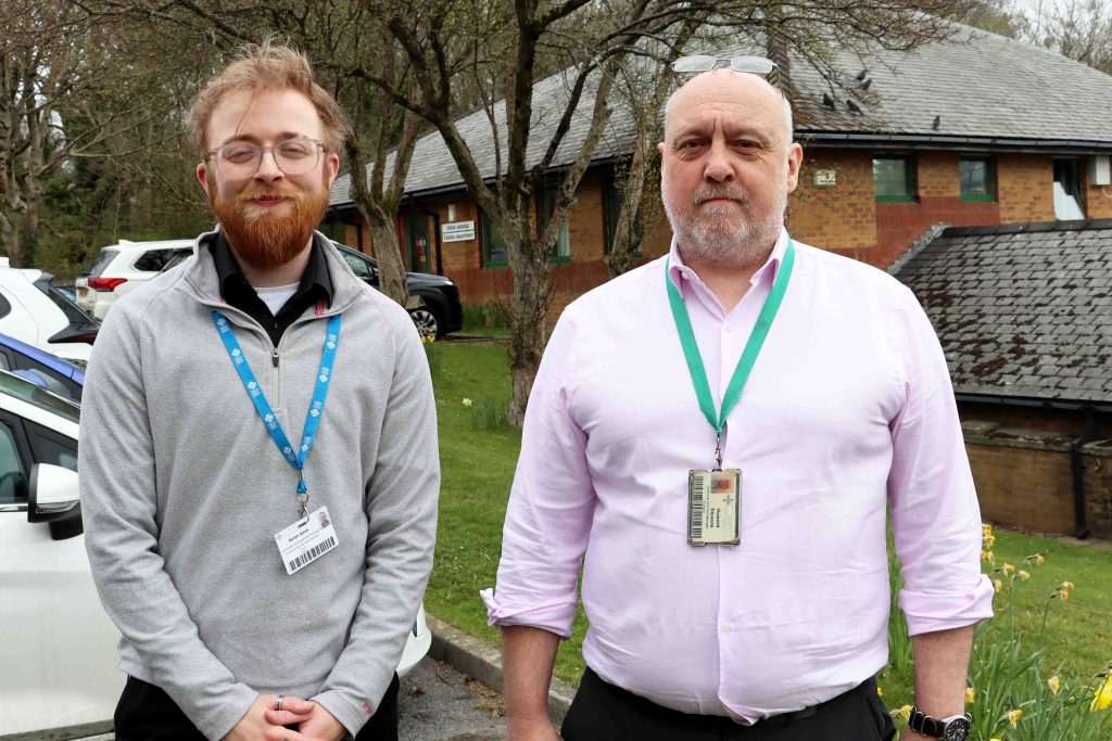 Technical services administrator Aeron Jones, left, and Howard Stevens, technical services manager