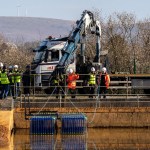 Heat exchangers being installed into the treatment lagoons