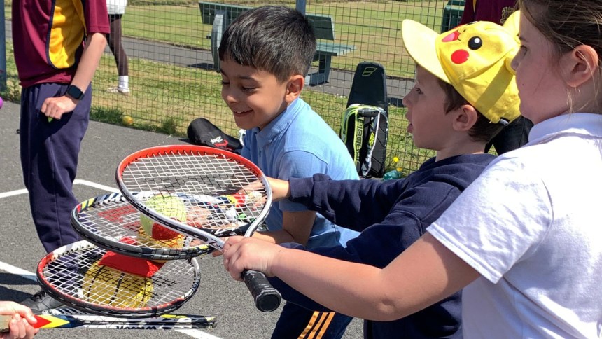 Young people taking part in the Jim Lightbody Swansea Primary Schools Tennis Festivals.