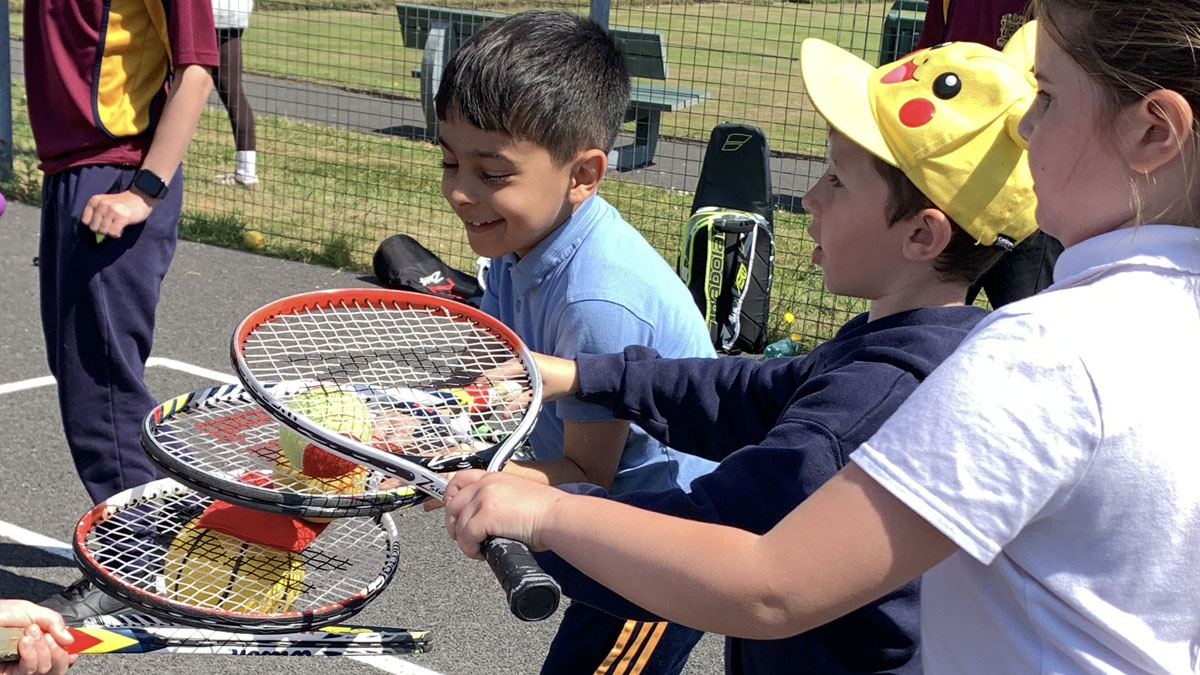 Young people taking part in the Jim Lightbody Swansea Primary Schools Tennis Festivals.