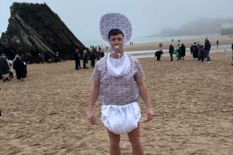 Lloyd at his Boxing Day fundraising swim in Tenby and the New Year’s Day swim in Saundersfoot