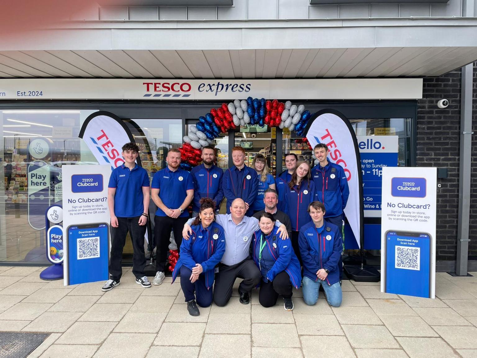 Tesco Express staff at its new Carmarthen Road store in Fforestfach