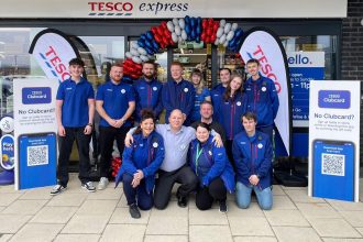 Tesco Express staff at its new Carmarthen Road store in Fforestfach