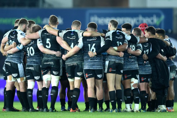 Ospreys players on the pitch
