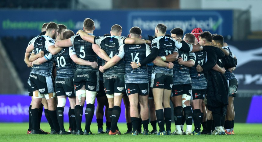 Ospreys players on the pitch