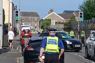 Police in New Dock Road in Llanelli