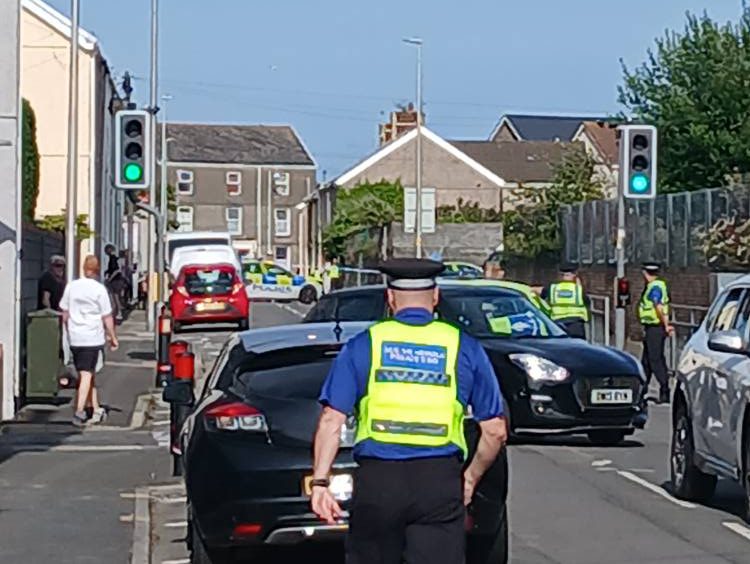 Police in New Dock Road in Llanelli