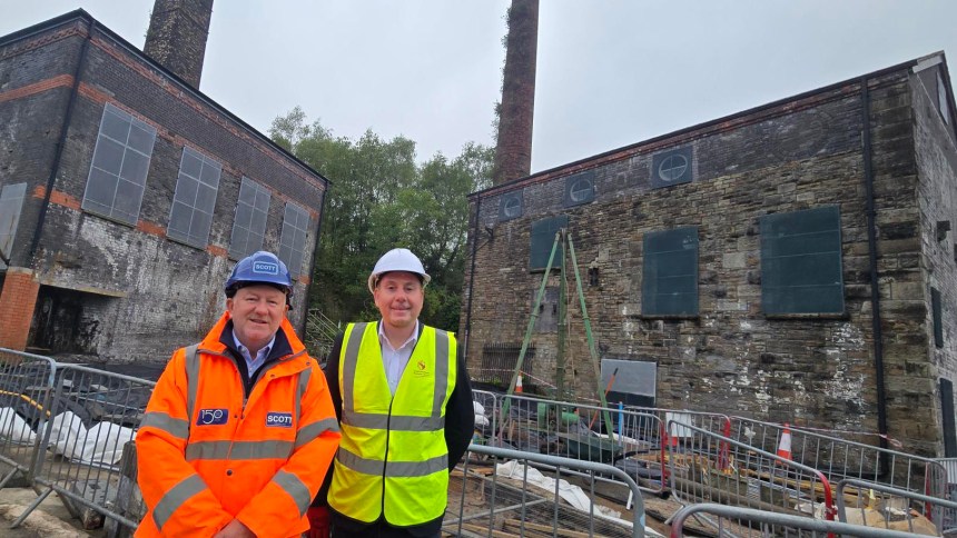 Swansea Council leader Rob Stewart, right, outside the city's Vivian and Musgrave Engine Houses with Mark Bowen, managing director, of main contractor Andrew Scott. Pic: Swansea Council