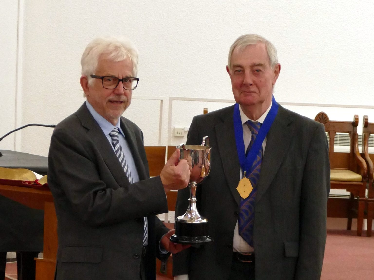 Presentation of the Cup for UK Transport History Book of the Year, the author Stephen Hughes on the left