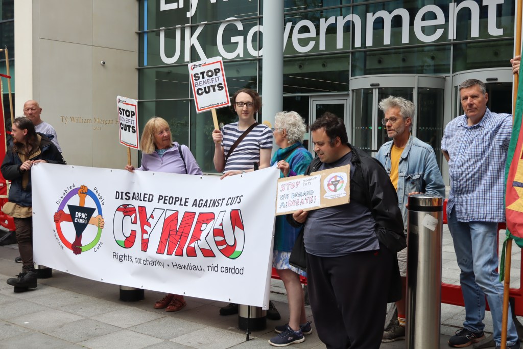 Disability campaigners outside the Government building where the consultation was taking place.
