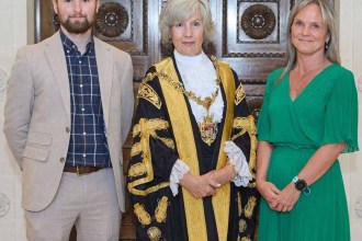 Lord Mayor of Swansea, Cheryl Philpott, with Swansea Bay Health Charity's charity support manager, Lewis Bradley, and SWWCC oncology service manager Kate Ashton