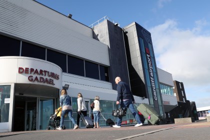 Travellers entering the departures area at Cardiff Airport, October 2025