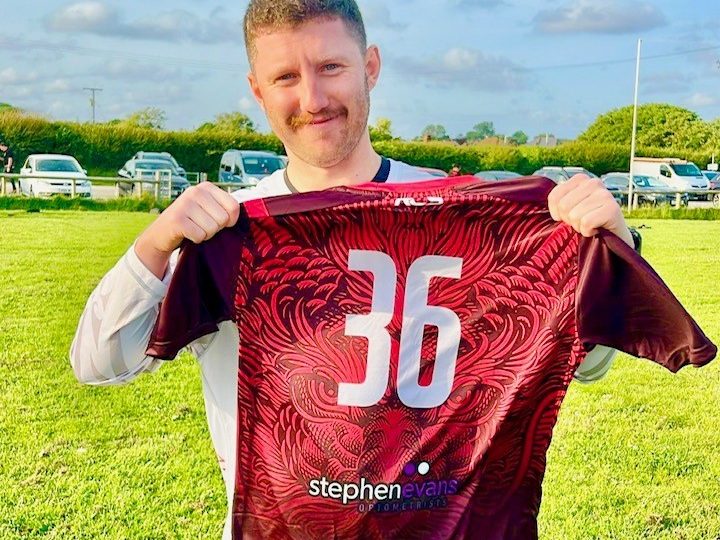 Henry Evans with team shirt sponsored by Stephen Evans Optometrists