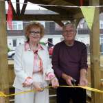 Councillor Jo Hale, Neath Port Talbot Council’s Cabinet Member for Adult Social Services and Alan Roberts, local resident and Chair of the Friends of Sandfields Community group, officially open Sandfields Community Garden.