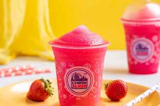 a cup of slushy on a plate