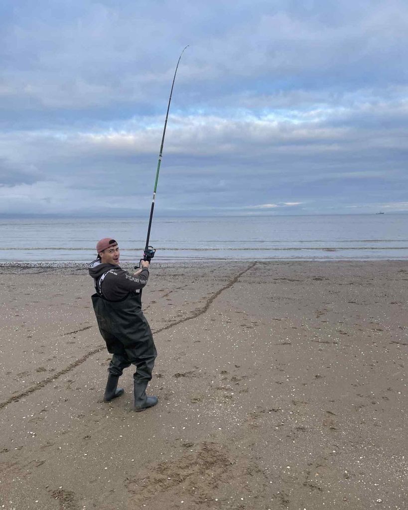 Alex angling on Swansea beach