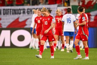 Wales’ Jessica Fishlock is dejected after her side concedes a goal during the UEFA Women’s Euro 2025 Group D Match between England and Wales at the St.Gallen Arena, in Switzerland. (Image: Ashley Crowden / FAW)