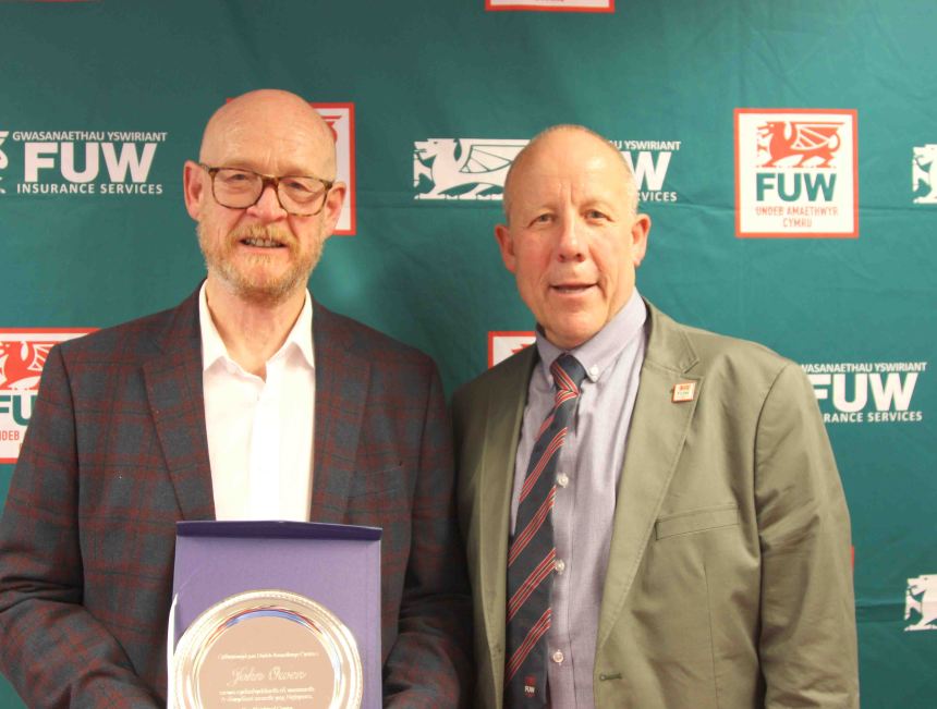 At this year’s Royal Welsh Show, John Owen was recognised for his outstanding contribution to Welsh farming, winning the Farmers’ Union of Wales (FUW) External award for services to agriculture.
