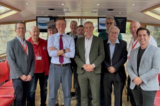Dr Alex Langlands, Associate Professor and CHART co-director, with Torsten Bell MP, members of Swansea Council and the team from the Swansea Community Boat Trust at the launch of the report