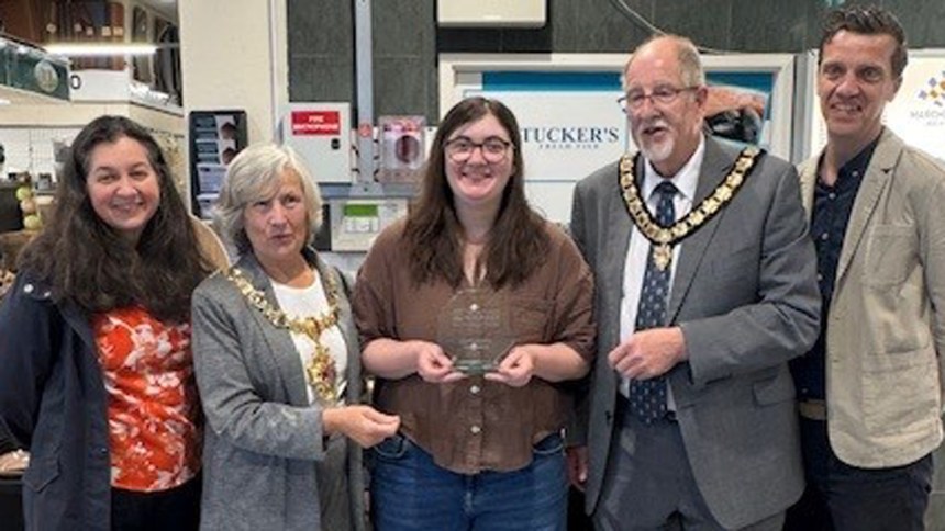 Bethany Coram, of Coram Ceramics, picks up her award.