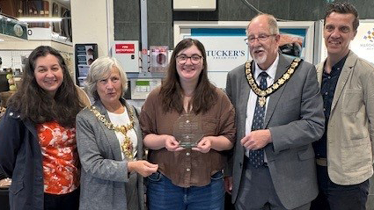 Bethany Coram, of Coram Ceramics, picks up her award.