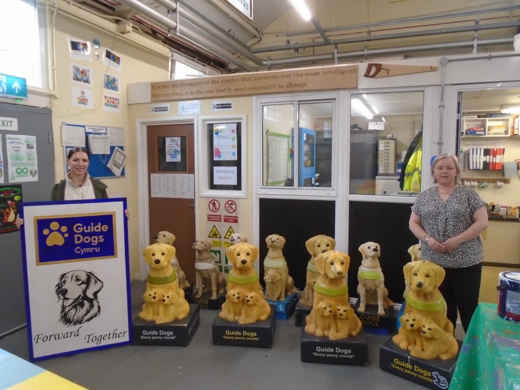 Natalie de Maid and Ruth Evans of Guide Dogs Cymru delivering the collecting boxes to HMP Swansea for refurbishment