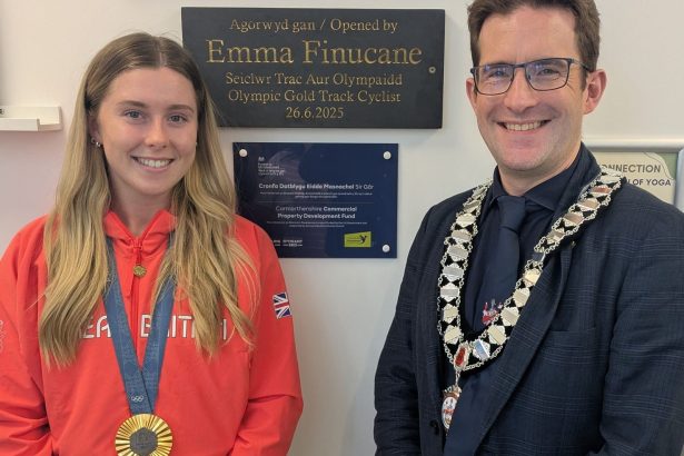 Olympic cyclist Emma Finucane and Carmarthen deputy mayor Cllr Russell Sparks (Image: KC Leisure)