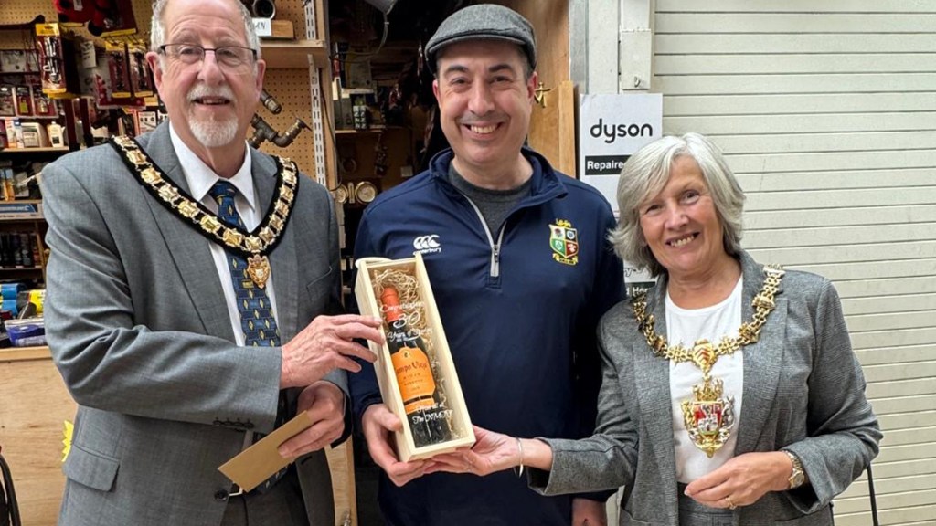 Wayne Holmes is recognised for his 30 years of trading at Swansea Market.