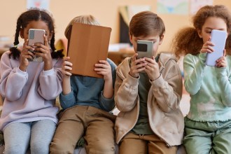 Children using mobile devices
