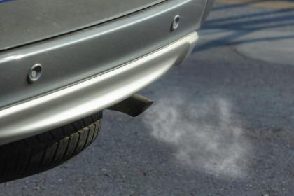 silver car with black exhaust pipe