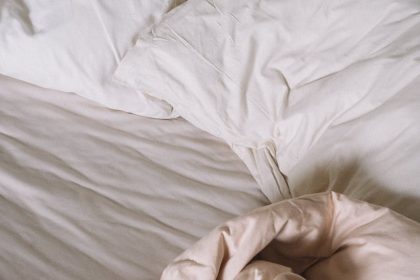 pillows and blanket on the bed