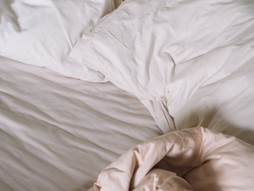 pillows and blanket on the bed
