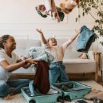 mother and daughter playing with clothes