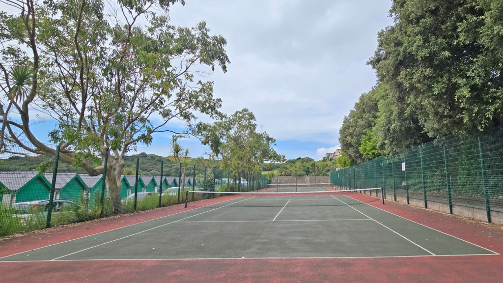 The current high-quality Langland Bay tennis courts that that will remain