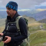 Swansea man Paul Coker, living with type 1 diabetes, standing outdoors on a mountain path. He is contributing to research aimed at improving access to eye care and preventing avoidable sight loss