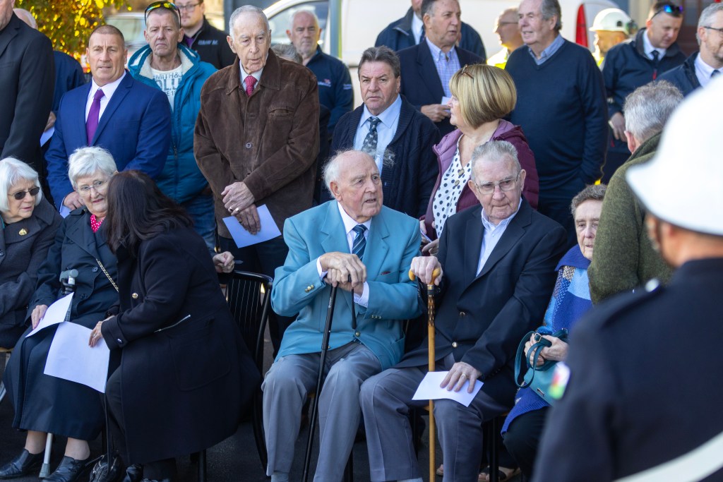 Alan Sherratt’s family and retired firefighters attend the Red Plaque unveiling in Swansea to honour his memory.