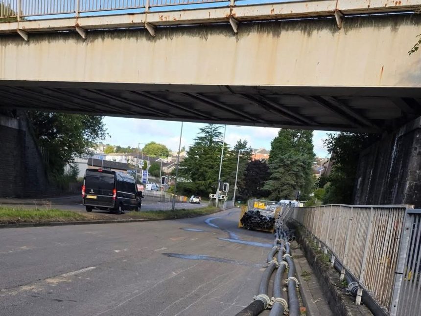 Pumps used to clear the flooded Cwmbwrla Roundabout