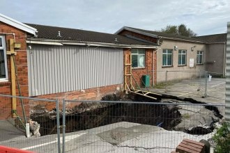 Large sinkhole under the carpark and toilets of Cwmfelin Social Club. Underneath is apparently an old tramway, a sewer and a culvert (Burlais Brook)