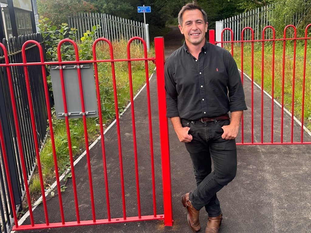 Cllr Andrew Stevens at the new cycle and walking missing link