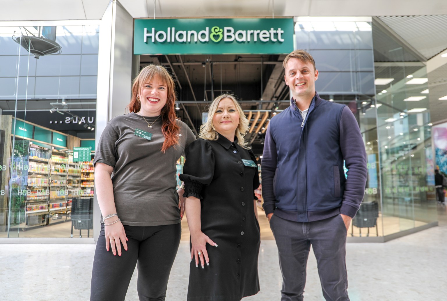 Group photo of the Holland & Barrett Swansea store team with Centurion Group’s Property Director at the opening of the retailer’s new flagship store in the Quadrant Shopping Centre.