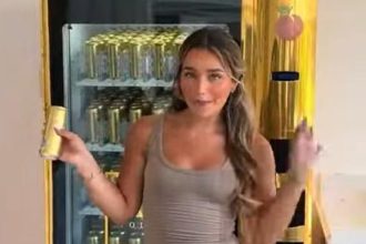 Screenshot of a banned TikTok advert where Love Island’s Lucinda Strafford received a gold AU Vodka vending machine stocked with Juicy Peach flavour, ruled in breach of alcohol advertising rules by the ASA.