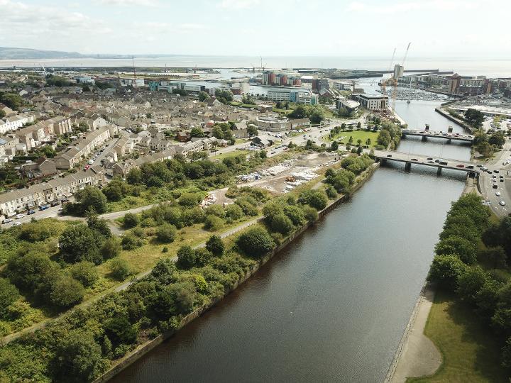 Drone image shows Swansea’s St Thomas riverside site and waterfront district, where plans propose 158 new homes and public realm regeneration.