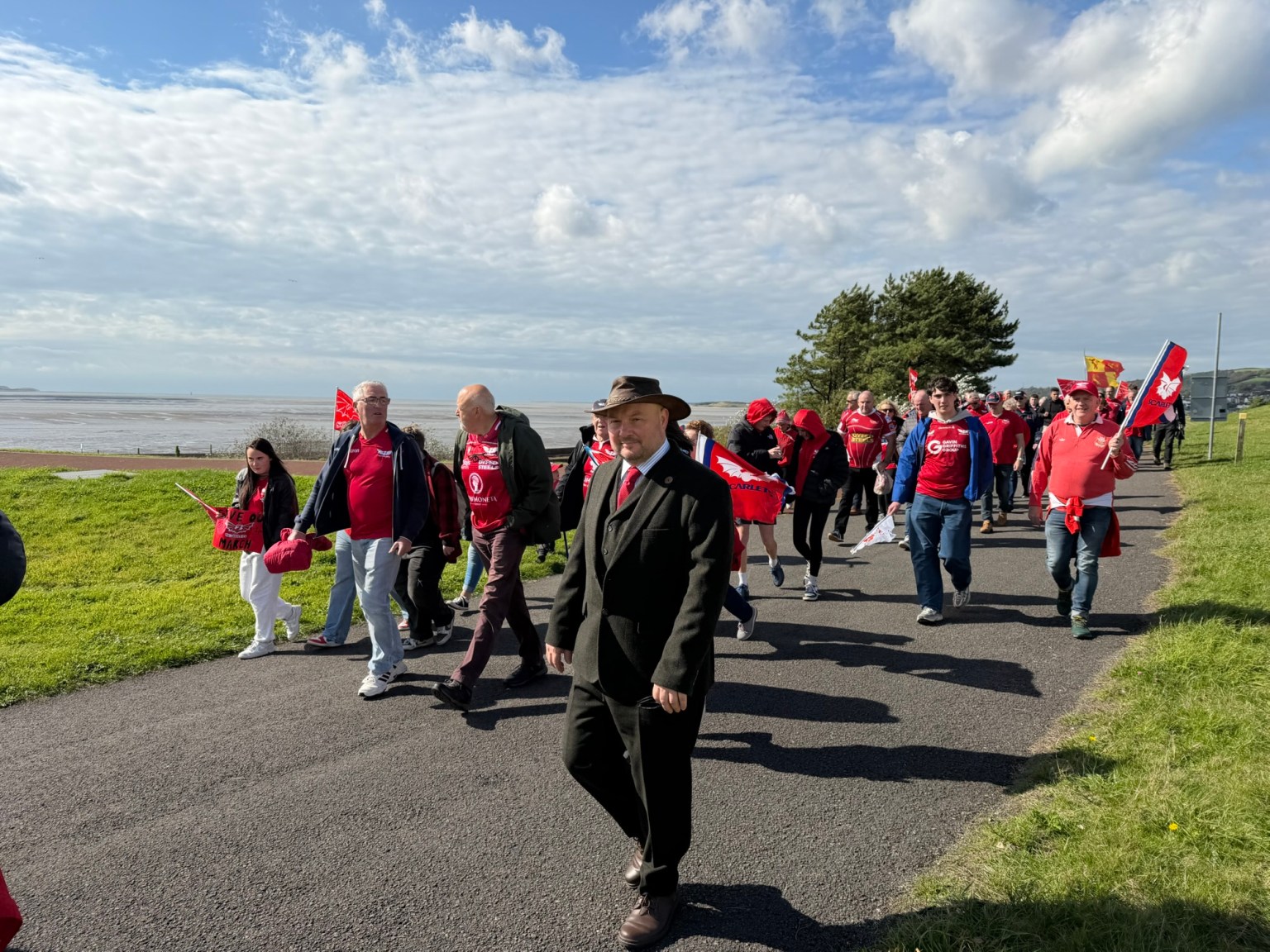 Kidwelly Mayor, Carl Peters-Bond walking with the crowd