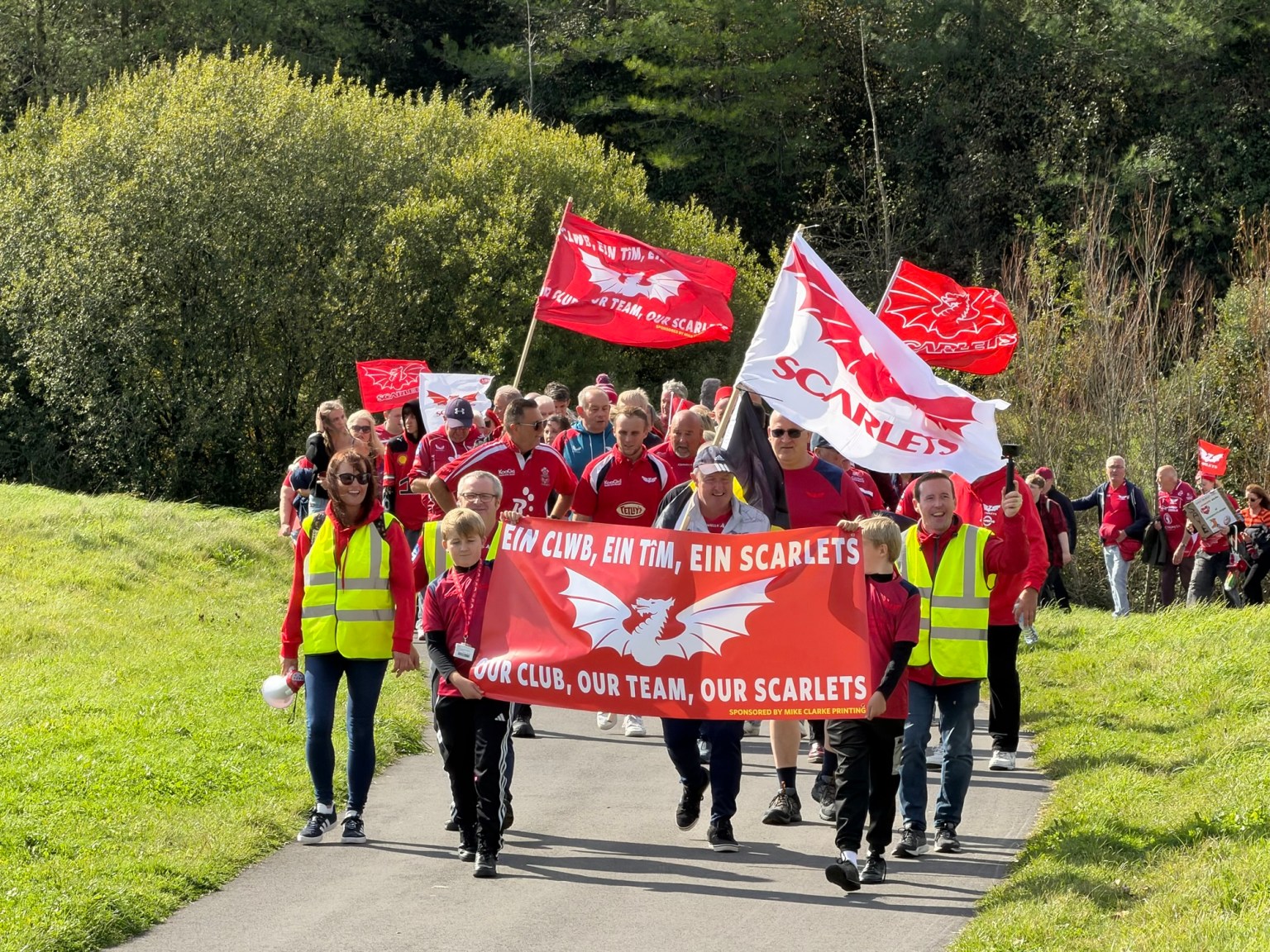 The march with banners and flags held high