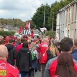 Crowds march down Andrew Street