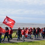The crowd set off from Sandy Water Park along the Millenium Coastal path