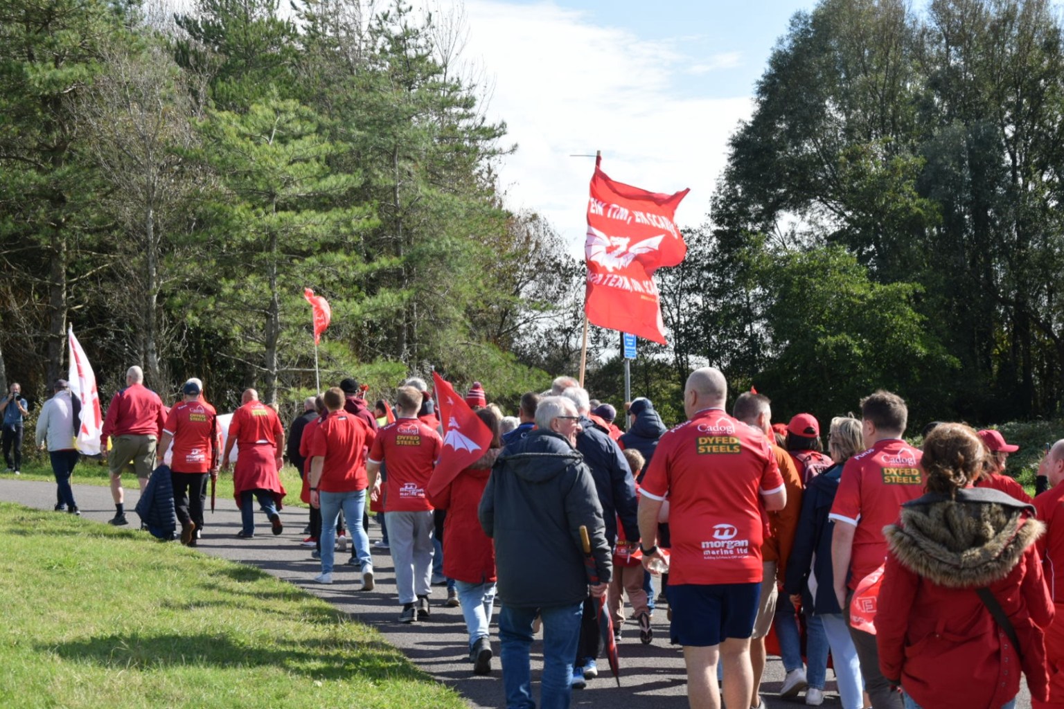 Scarlets fans walking through Sandy Water Park