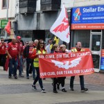 Marchers make their way through Llanelli town centre.