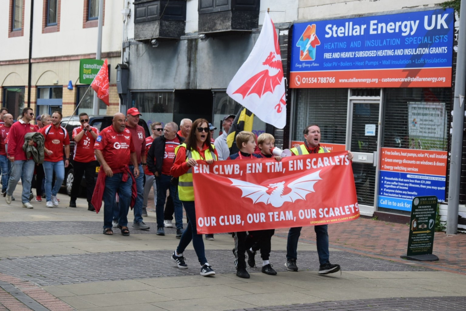 Marchers make their way through Llanelli town centre.